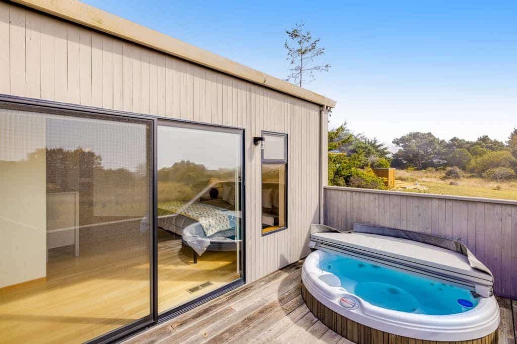 This Sea Ranch home frames the Pacific like a painting -- and the view changes by the hour. Soak in the hot tub as the sun dips below the Pacific. Your deck is a front-row seat to the Pacific. Room for 6 in this 3-bedroom home. Just a 3-minute walk to the heated community pool across the street. The Sonoma Coast's best-kept secret is waiting for you. The rhythm of the waves sets the pace here -- unhurried mornings, lingering sunsets, deep sleep.