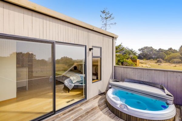 This Sea Ranch home frames the Pacific like a painting -- and the view changes by the hour. Soak in the hot tub as the sun dips below the Pacific. Your deck is a front-row seat to the Pacific. Room for 6 in this 3-bedroom home. Just a 3-minute walk to the heated community pool across the street. The Sonoma Coast's best-kept secret is waiting for you. The rhythm of the waves sets the pace here -- unhurried mornings, lingering sunsets, deep sleep.