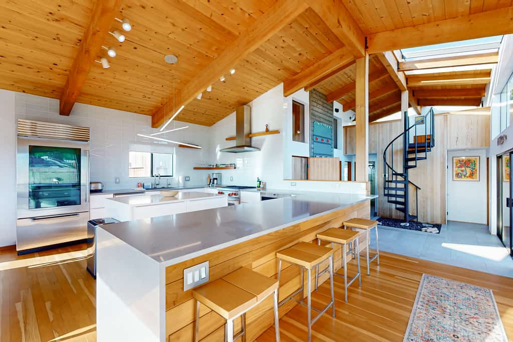 The Pacific shimmers in the distance as you unwind in this Sea Ranch retreat. End the day in your private hot tub with the ocean as your soundtrack. Bring your pup -- dogs love the bluff trails here. Room for 6 in this 2-bedroom home. Just a 10-minute walk to the heated community pool. Trails, tidepools, and two heated community pools -- all within reach. Watch the fog roll in from the deck as the coastline disappears and reappears like magic.