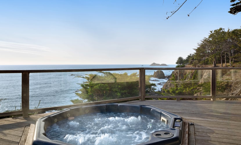 Salt spray, crashing waves, and a front-row seat to the Pacific -- welcome to the Sonoma Coast. End the day in your private hot tub with the ocean as your soundtrack. A warm fire and ocean views anchor cozy evenings in. Room for 4 in this 2-bedroom home. Walk to local restaurants. River access and Gualala Point Regional Park are a short drive away. Art galleries, river trails, and the wild Pacific are all within reach.