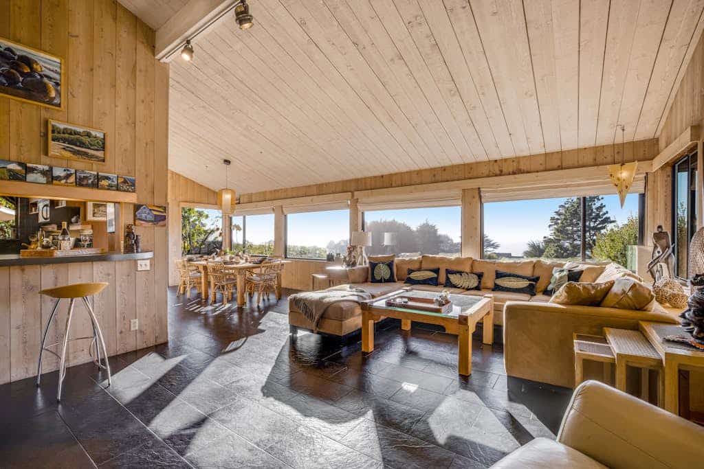 Wake to ocean views and the call of seabirds in this light-filled coastal home. End the day in your private hot tub with the ocean as your soundtrack. Bring your pup -- dogs love the bluff trails here. Room for 6 in this 3-bedroom home. Sea Ranch community pools, tennis courts, and the Lodge are nearby. Architecture, nature, and the Pacific -- Sea Ranch has it all. Step outside and the Pacific stretches before you -- this is the Sonoma Coast at its most dramatic.