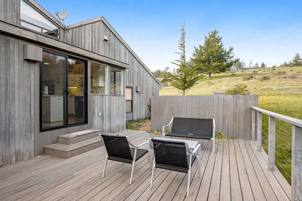 Golden light spills through the windows as you can catch distant views of the Pacific. Curl up by the fireplace as fog rolls in off the Pacific. Step outside to a deck overlooking the ocean. Room for 4 in this 2-bedroom home. A short walk from the heated community pool. Your front door opens to Sea Ranch's 50 miles of trails and the wild Sonoma Coast. Salt air drifts through the windows as the Pacific puts on its daily show just beyond the deck.