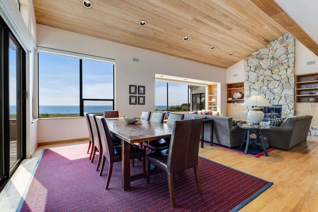 Open the curtains to the Pacific -- this Sea Ranch home puts the ocean in every window. End the day in your private hot tub with the ocean as your soundtrack. Curl up by the fireplace as fog rolls in off the Pacific. Room for 8 in this 4-bedroom home. Near the heated community pool. Whale watching, sunset hikes, and starlit skies -- the coast is calling. The ever-changing ocean light fills the home, from golden mornings to fiery sunsets.