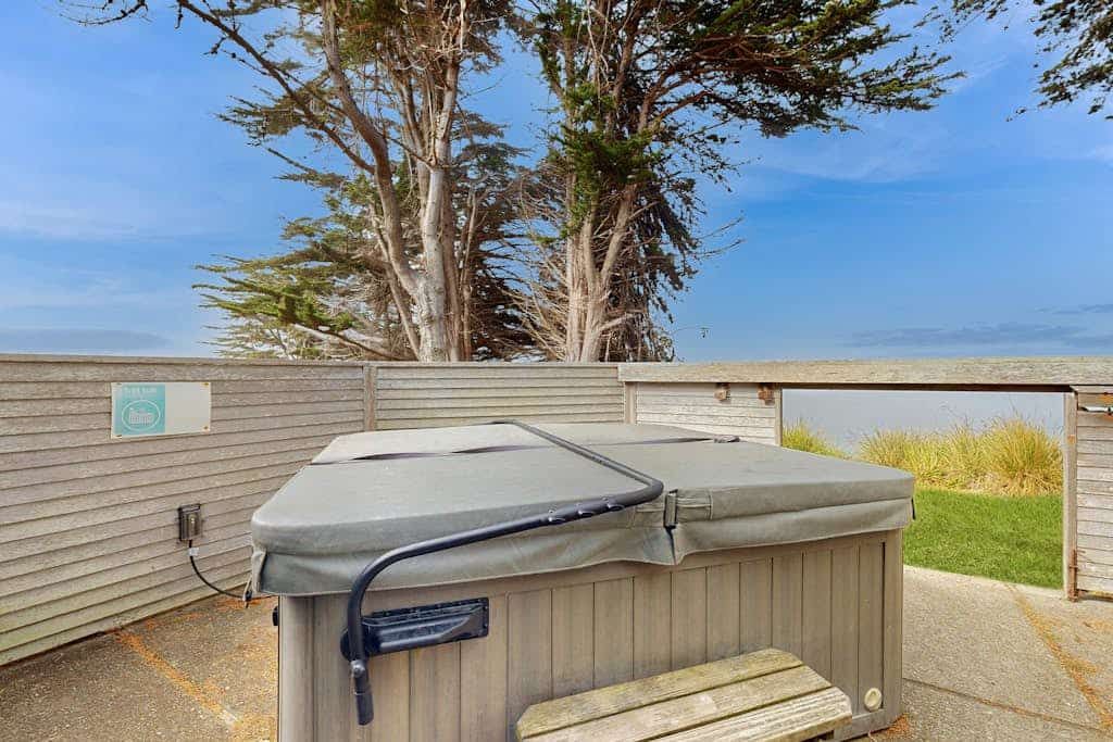 Step onto your deck to unbroken ocean views stretching to the horizon. Soak in the hot tub as the sun dips below the Pacific. Bring your pup -- dogs love the bluff trails here. Room for 6 in this 3-bedroom home. Sea Ranch community pools, tennis courts, and the Lodge are nearby. Miles of bluff-top trails and hidden beaches are yours to explore. The rugged Sonoma coastline unfolds from the deck -- raw, dramatic, and endlessly watchable.