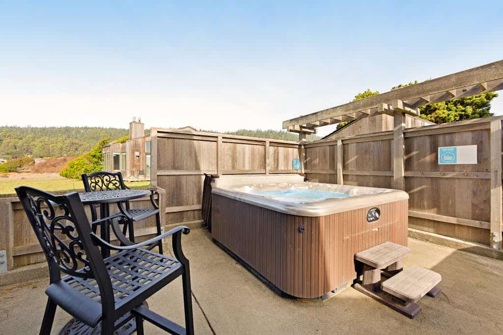 Fog, sun, and sea -- the ever-changing coastal light makes every morning feel new. Soak in the hot tub as the sun dips below the Pacific. Bring your pup -- dogs love the bluff trails here. Room for 8 in this 3-bedroom home. Sea Ranch community pools, tennis courts, and the Lodge are nearby. Trails, tidepools, and two heated community pools -- all within reach. The rugged Sonoma coastline unfolds from the deck -- raw, dramatic, and endlessly watchable.