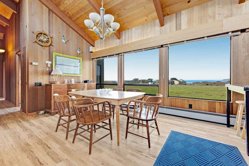 Fog, sun, and sea -- the ever-changing coastal light makes every morning feel new. Soak in the hot tub as the sun dips below the Pacific. Bring your pup -- dogs love the bluff trails here. Room for 8 in this 3-bedroom home. Sea Ranch community pools, tennis courts, and the Lodge are nearby. Trails, tidepools, and two heated community pools -- all within reach. The rugged Sonoma coastline unfolds from the deck -- raw, dramatic, and endlessly watchable.