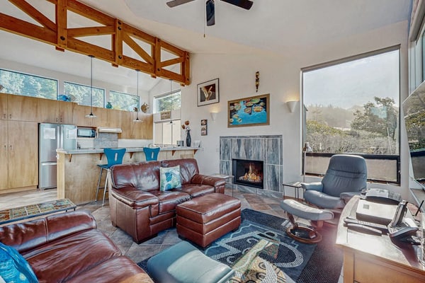Fog, sun, and sea -- the ever-changing coastal light makes every morning feel new. End the day in your private hot tub with the ocean as your soundtrack. Curl up by the fireplace as fog rolls in off the Pacific. Room for 4 in this 2-bedroom home. Sea Ranch community pools, tennis courts, and the Lodge are nearby. Architecture, nature, and the Pacific -- Sea Ranch has it all. The bluff trail starts steps from the door, winding along the cliffs above crashing whitecaps.