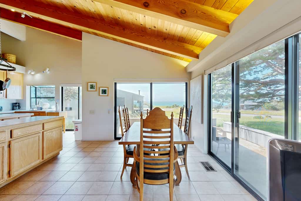 Your deck doubles as a whale-watching station during migration season at this ocean-view retreat. Your deck is a front-row seat to the Pacific. Room for 6 in this 2-bedroom home. Near the heated community pool. Your front door opens to Sea Ranch's 50 miles of trails and the wild Sonoma Coast. Morning coffee tastes different when the view is the Pacific -- and it never gets old. Summer fog burns off by midday, leaving warm afternoons perfect for trail hikes and tidepooling.