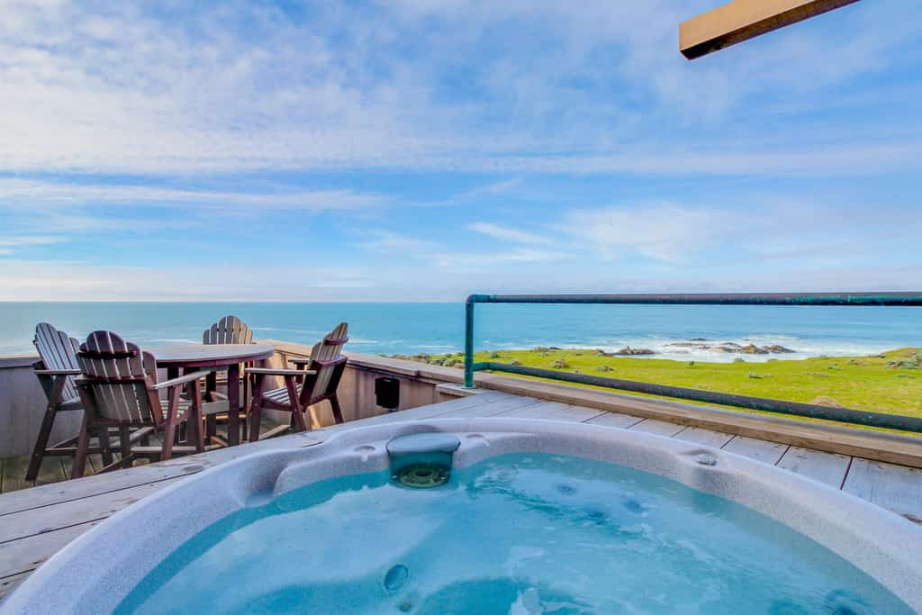 Nothing between you and the Pacific but fresh salt air and the sound of the surf. Soak in the hot tub as the sun dips below the Pacific. Bring your pup -- dogs love the bluff trails here. Room for 7 in this 3-bedroom home. Just a 9-minute walk to the heated community pool. Sea Ranch's iconic trails, tidepools, and heated pools are all at your doorstep. The light here shifts by the hour -- silver mornings, gold afternoons, pink-and-orange sunsets.