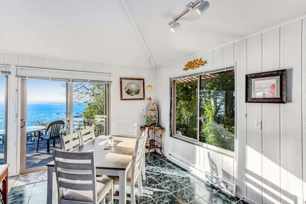 Ocean views stretch across the horizon from this sun-filled coastal home. Soak in the hot tub as the sun dips below the Pacific. Step outside to a deck overlooking the ocean. Room for 4 in this 1-bedroom home. Local restaurants, river access, and Gualala Point Regional Park are a short drive away. Art galleries, river trails, and the wild Pacific are all within reach. At low tide, the rock shelves reveal a hidden world of anemones, crabs, and starfish.