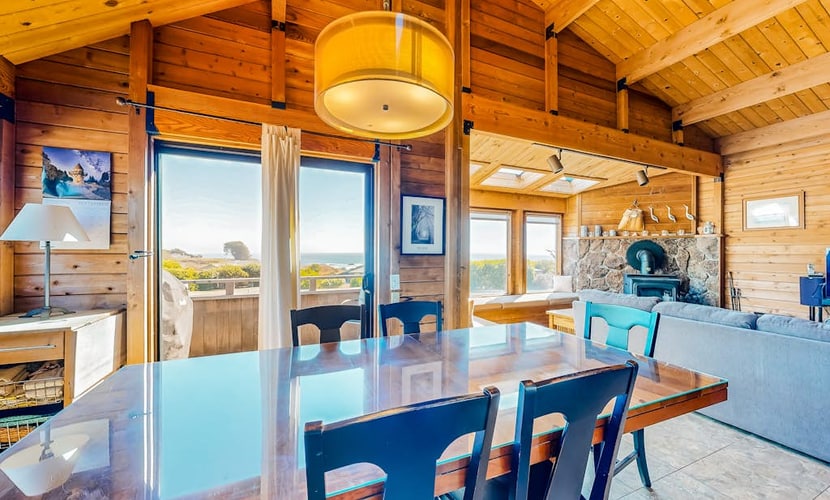 Ocean and meadow views greet you from the moment you walk through the door. Soak in the hot tub as the sun dips below the Pacific. Bring your pup -- dogs love the bluff trails here. Room for 6 in this 3-bedroom home. Sea Ranch community pools, tennis courts, and the Lodge are nearby. Whale watching, sunset hikes, and starlit skies -- the coast is calling. Whale spouts on the horizon, hawks riding the updrafts -- nature puts on a show from every window.