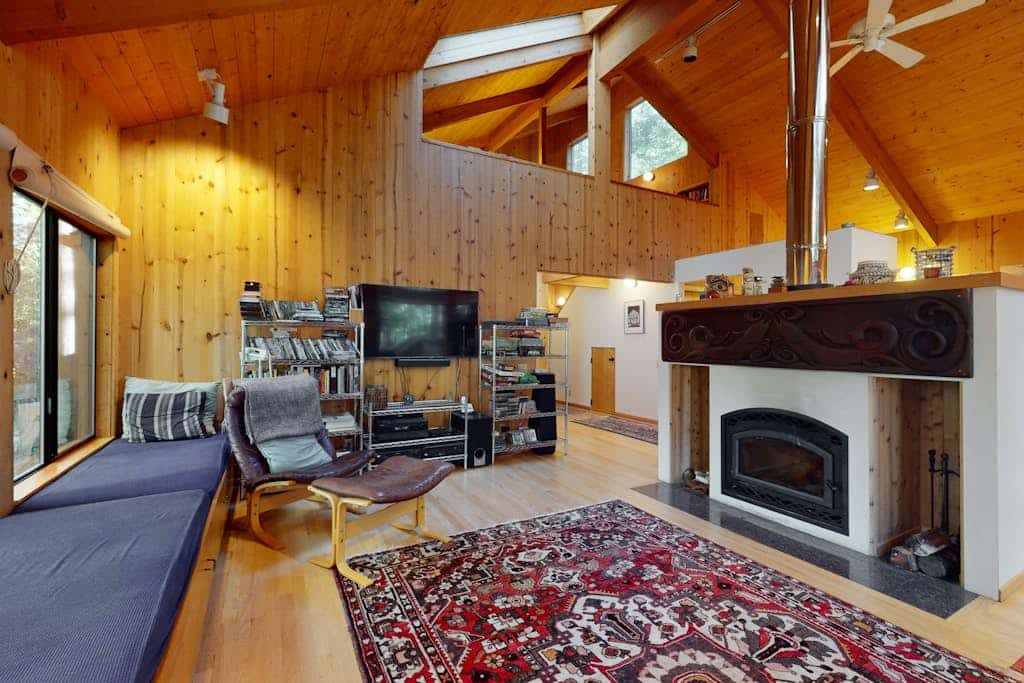 Forest light filters through the canopy onto this secluded Sea Ranch gem. End the day in your private hot tub surrounded by forest quiet. A warm fire anchors cozy evenings after forest hikes. Room for 4 in this 2-bedroom home. Sea Ranch community pools, tennis courts, and the Lodge are nearby. Trails, tidepools, and two heated community pools -- all within reach. Wildflower meadows and shaded forest trails start right outside your door.