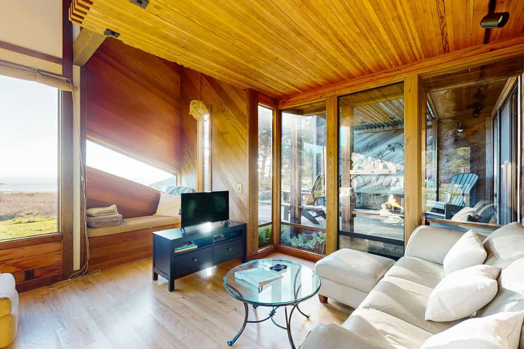 Catch the sunset over the Pacific every evening from your own private deck. Soak in the hot tub as the sun dips below the Pacific. A warm fire and ocean views anchor cozy evenings in. Room for 6 in this 3-bedroom home. Near the heated community pool. Sea Ranch's iconic trails, tidepools, and heated pools are all at your doorstep. The rugged Sonoma coastline unfolds from the deck -- raw, dramatic, and endlessly watchable.