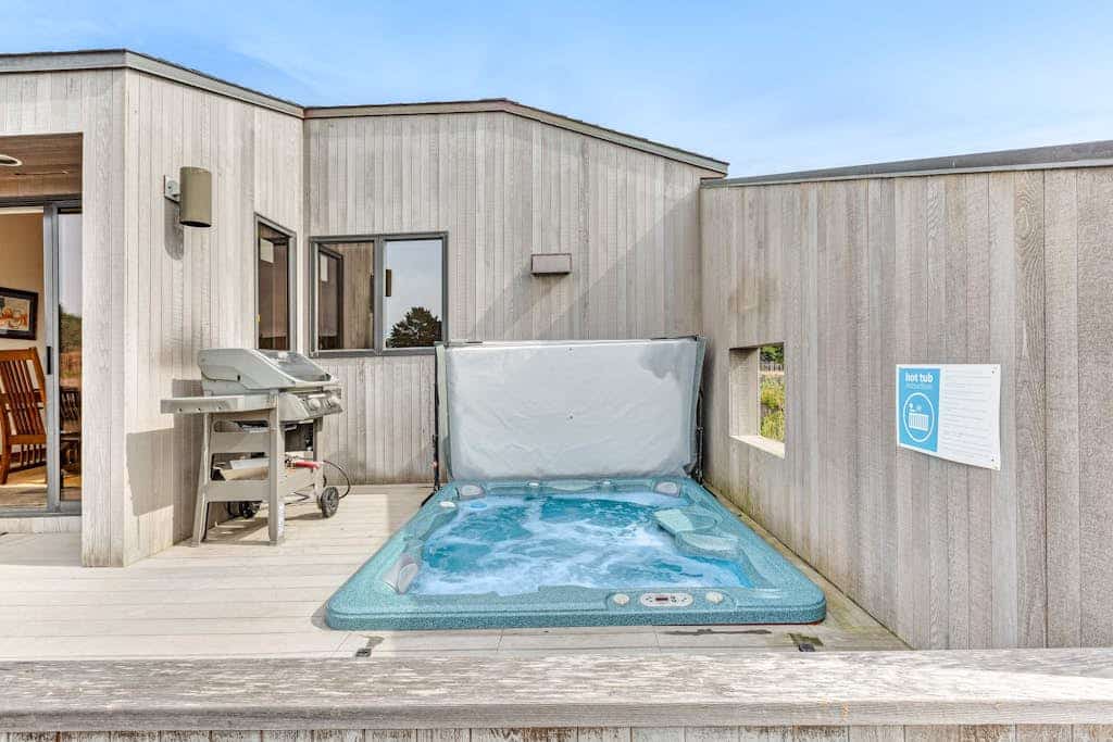 This Sea Ranch home frames the Pacific like a painting -- and the view changes by the hour. Soak in the hot tub as the sun dips below the Pacific. Curl up by the fireplace as fog rolls in off the Pacific. Room for 6 in this 2-bedroom home. Sea Ranch community pools, tennis courts, and the Lodge are nearby. Your front door opens to Sea Ranch's 50 miles of trails and the wild Sonoma Coast. Nothing resets your pace like watching the tide come and go from your own living room.