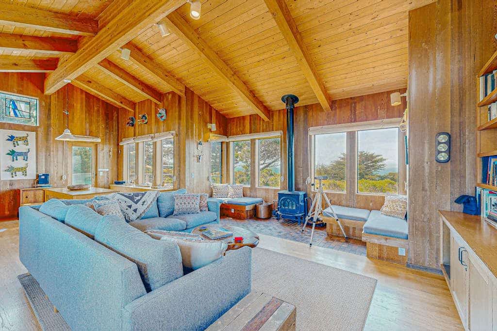 Wake to ocean views and the call of seabirds in this light-filled coastal home. End the day in your private hot tub with the ocean as your soundtrack. Step outside to a deck overlooking the ocean. Room for 6 in this 3-bedroom home. A short walk from Pebble Beach. Miles of bluff-top trails and hidden beaches are yours to explore. Hear the surf from your pillow and watch the waves from your coffee spot. Pack layers -- mornings start with fog, afternoons warm to sun, and evenings glow at sunset.