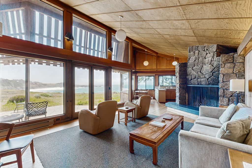 The ocean is your backyard -- hear the waves from every room in this coastal haven. Bring your pup -- dogs love the bluff trails here. A warm fire and ocean views anchor cozy evenings in. Room for 8 in this 3-bedroom home. Near the heated community pool. Sea Ranch's iconic trails, tidepools, and heated pools are all at your doorstep. The rugged Sonoma coastline unfolds from the deck -- raw, dramatic, and endlessly watchable.