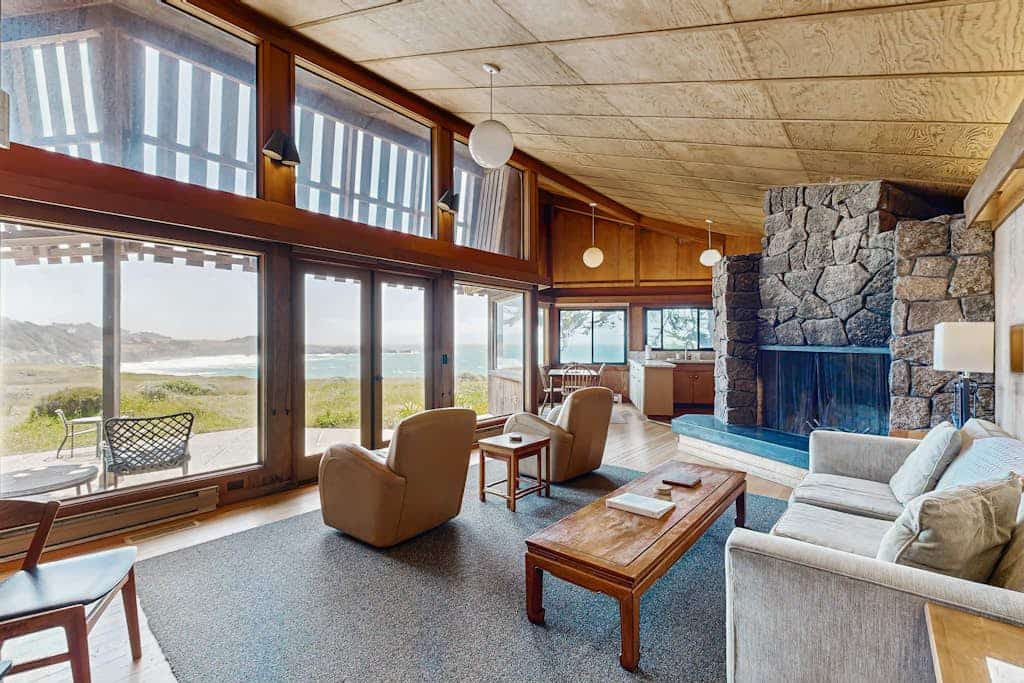 The ocean is your backyard -- hear the waves from every room in this coastal haven. Bring your pup -- dogs love the bluff trails here. A warm fire and ocean views anchor cozy evenings in. Room for 8 in this 3-bedroom home. Near the heated community pool. Sea Ranch's iconic trails, tidepools, and heated pools are all at your doorstep. The rugged Sonoma coastline unfolds from the deck -- raw, dramatic, and endlessly watchable.