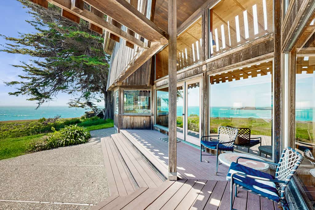 The ocean is your backyard -- hear the waves from every room in this coastal haven. Bring your pup -- dogs love the bluff trails here. A warm fire and ocean views anchor cozy evenings in. Room for 8 in this 3-bedroom home. Near the heated community pool. Sea Ranch's iconic trails, tidepools, and heated pools are all at your doorstep. The rugged Sonoma coastline unfolds from the deck -- raw, dramatic, and endlessly watchable.
