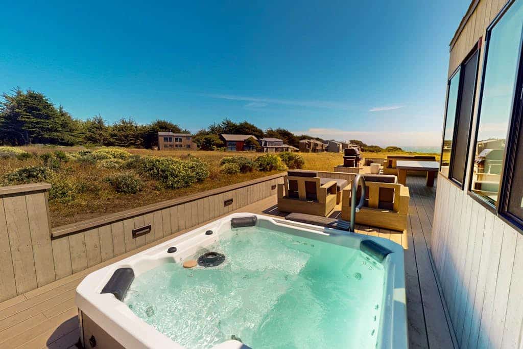 Sip your morning coffee with sweeping ocean panoramas from this Sea Ranch perch. Soak in the hot tub as the sun dips below the Pacific. A warm fire and ocean views anchor cozy evenings in. Room for 6 in this 3-bedroom home. Near the heated community pool. The Sonoma Coast's best-kept secret is waiting for you. Watch the fog roll in from the deck as the coastline disappears and reappears like magic.