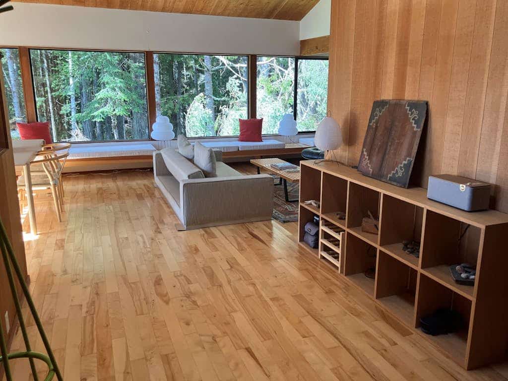 Perched above the iconic Knipp-Stengel Barn with sweeping ocean and forest views, this timber-framed Sea Ranch retreat blends bold architecture with coastal calm. Soak in the private hot tub under the stars, hike blufftop trails from your doorstep, or settle into the sun-drenched window seats and watch the world slow down.

Two bedrooms, two baths, and an open great room with soaring timber beams -- designed for couples or small groups chasing quiet, beauty, and adventure on the Sonoma Coast.