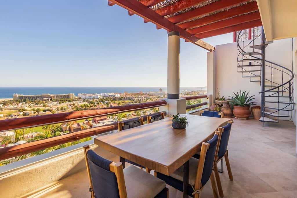 Luxury condo in Alegranza, San José del Cabo, featuring an open concept layout with a fully equipped kitchen, bright living area, and private terrace with partial ocean views. Comfortable bedrooms offer privacy and modern amenities. Enjoy a spacious private rooftop with lounge areas, pergola, and outdoor kitchen, perfect for relaxing or entertaining. Gated community with pools, tennis courts, gym, and prime location near beaches, dining, and golf.