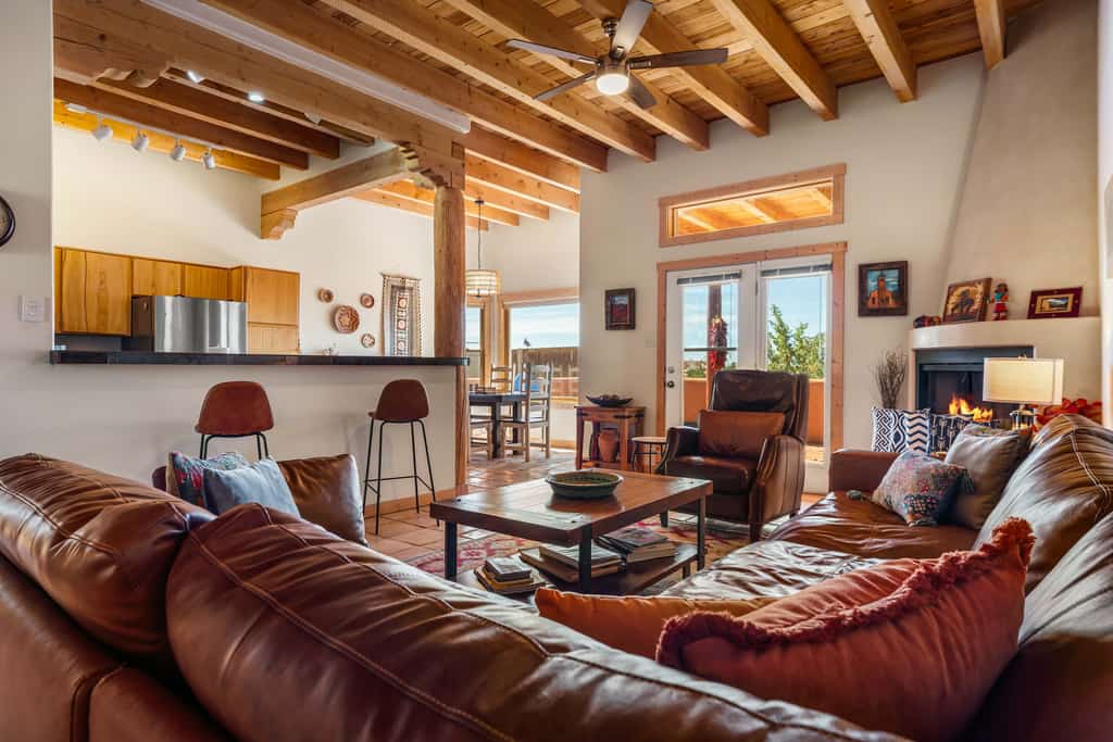 Laguna Azul is a peaceful 3-bedroom retreat in the Eldorado area just outside Santa Fe, with wide mountain views, star-filled skies, and easy single-level living. Gather by the fireplace in the open living area, cook in the full kitchen, and dine on the covered patio with a grill as the sun sets. Dog-friendly and surrounded by high-desert trails, it is an ideal base for families, friends, and anyone craving space, scenery, and a slower reset.
