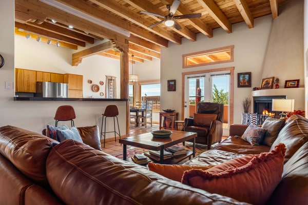 Laguna Azul is a peaceful 3-bedroom retreat in the Eldorado area just outside Santa Fe, with wide mountain views, star-filled skies, and easy single-level living. Gather by the fireplace in the open living area, cook in the full kitchen, and dine on the covered patio with a grill as the sun sets. Dog-friendly and surrounded by high-desert trails, it is an ideal base for families, friends, and anyone craving space, scenery, and a slower reset.