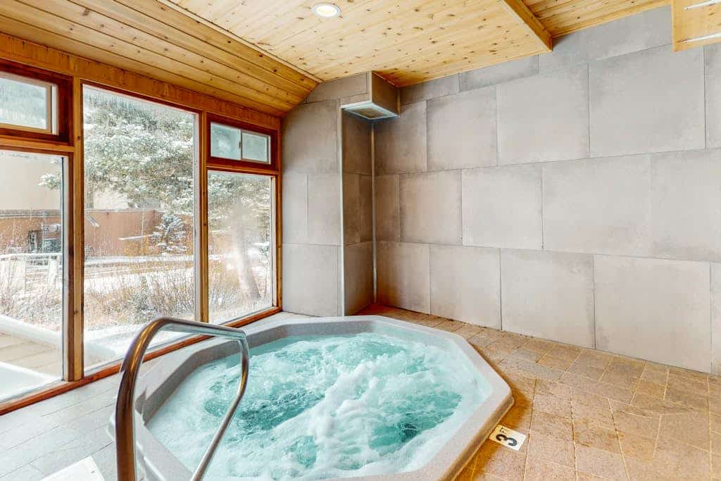 Welcome to Sierra Del Sol 36, a sunny, updated condo in the heart of Taos Ski Valley, just steps from the village and lifts. Soak in mountain and forest views from the private balcony, warm up by the wood-burning fireplace, and unwind in the shared seasonal hot tub. With the Lake Fork River right outside and room for seven, it is an ideal basecamp for ski days, summer hikes, and mountain air.