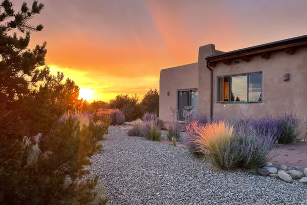 Welcome to Casa Cielo, a guest favorite adobe hideaway north of Taos where big skies and privacy set the tone. Soak in the hot tub under a blanket of stars, sip morning coffee on the expansive patio, or settle in for sunset with sweeping mountain views. Inside, there's viga ceilings, a kiva fireplace, and large windows framing the high desert landscape. With a gourmet kitchen and generous outdoor space for dining and relaxing, this 2,500 sq ft retreat invites you to slow down and reconnect.