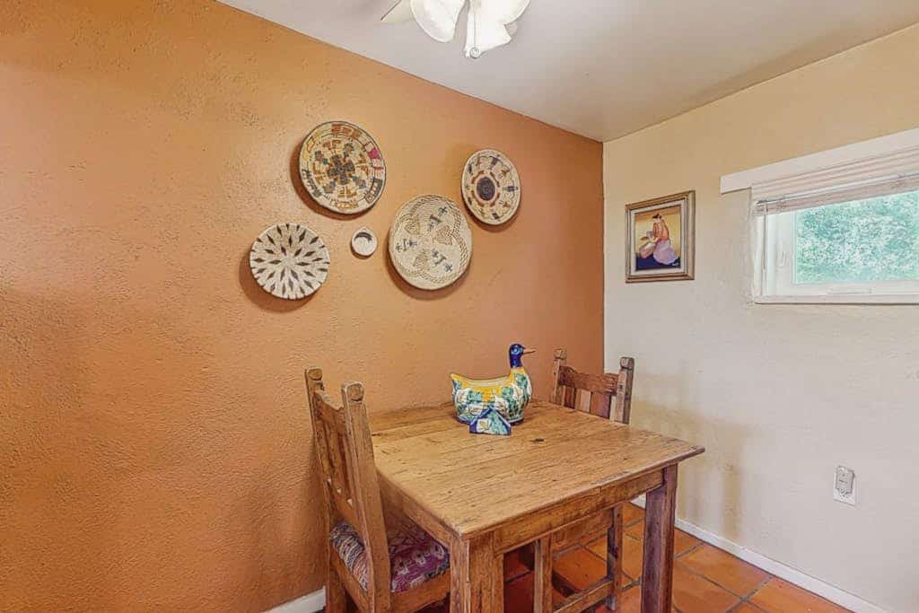 Welcome to Casita Antonio, a cozy, art-filled adobe casita just a short walk from the heart of Taos. Sip morning coffee on the private, coyote-fenced patio, cook in a sunny full kitchen, and unwind by the gas fireplace under a beamed ceiling. With a queen bedroom plus a sofa bed and a dog-friendly welcome, this single-level retreat is a charming, budget-friendly base for exploring the Plaza, galleries, and the high desert.