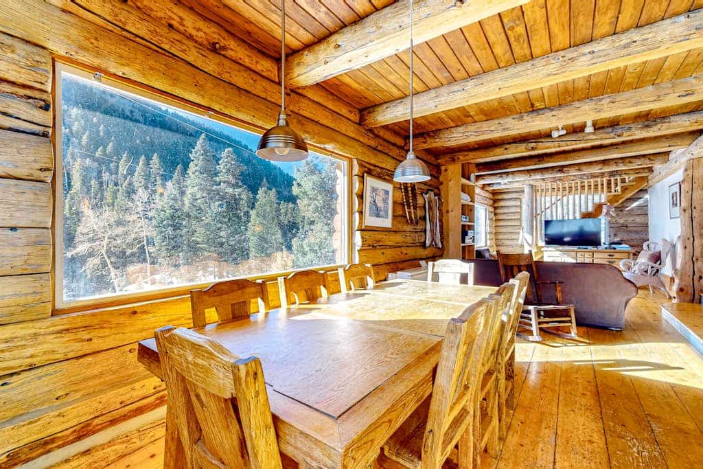 Welcome to Ridgerunner Cabin, a true log cabin tucked into Taos Ski Valley, less than a mile from the resort and surrounded by Carson National Forest and the Rio Hondo. Warm up by the cast iron wood stove and soak in the private hot tub among the pines. With a king bedroom, a spacious loft, and room for up to ten, it is a cozy alpine basecamp for ski trips and summer adventures alike.