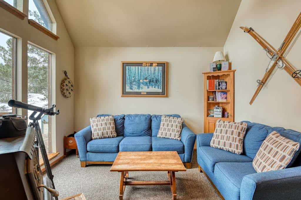 Welcome to the Chamberlain Chalet, a cozy multi-level cabin tucked into the pines above Angel Fire. With 2 bedrooms, a kids' loft with bunks, and room for 6, it is built for families. Soak in forest and mountain views through soaring windows, gather around the wood-burning stove for game nights, and spend summer days hiking, fishing, and exploring nearby Eagle Nest Lake and the Enchanted Circle. A quiet, wooded escape with space for everyone.