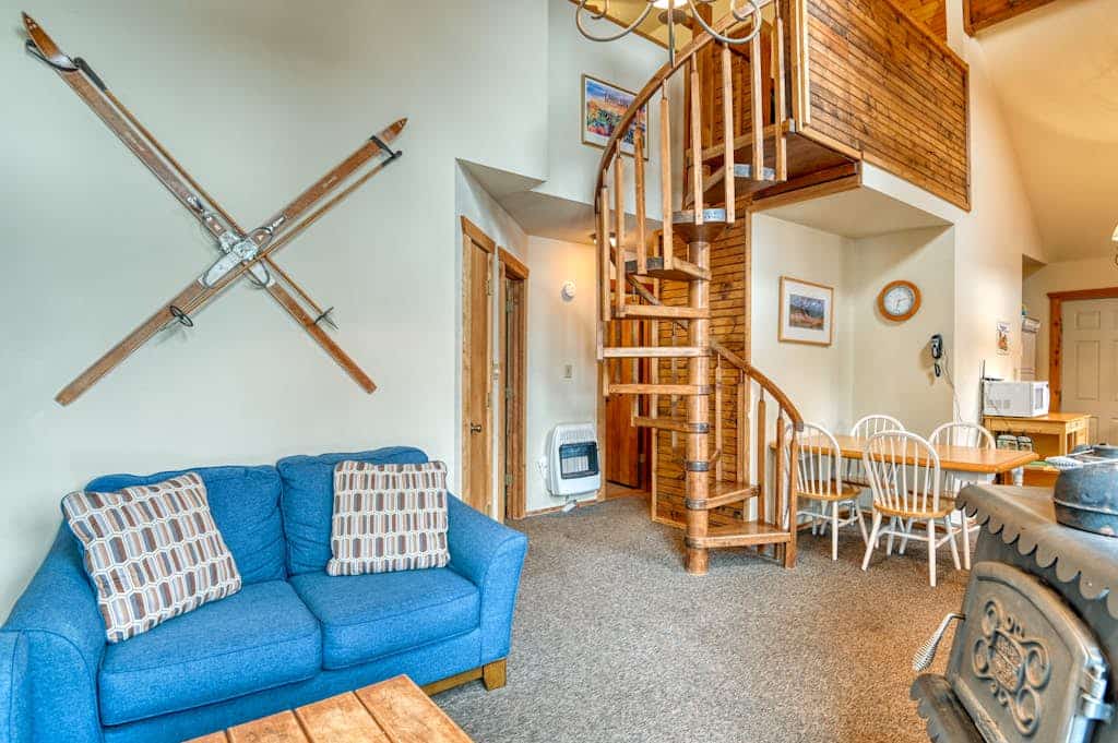 Welcome to the Chamberlain Chalet, a cozy multi-level cabin tucked into the pines above Angel Fire. With 2 bedrooms, a kids' loft with bunks, and room for 6, it is built for families. Soak in forest and mountain views through soaring windows, gather around the wood-burning stove for game nights, and spend summer days hiking, fishing, and exploring nearby Eagle Nest Lake and the Enchanted Circle. A quiet, wooded escape with space for everyone.