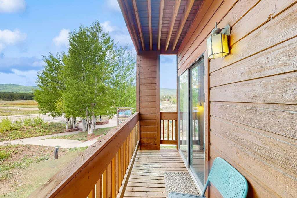 Unwind in the heart of the mountains at Christi Villa 100, a beautiful condo designed for easy living and romantic getaways. Just a half-mile from Angel Fire Resort, this inviting retreat pairs rustic wood accents with modern comforts. Start your morning with coffee on the private balcony and end your evening streaming your favorite movies by the fire. Whether you are here to hit the ski slopes, conquer the mountain bike trails, or simply recharge, this condo provides the perfect basecamp for your New Mexico adventures. 