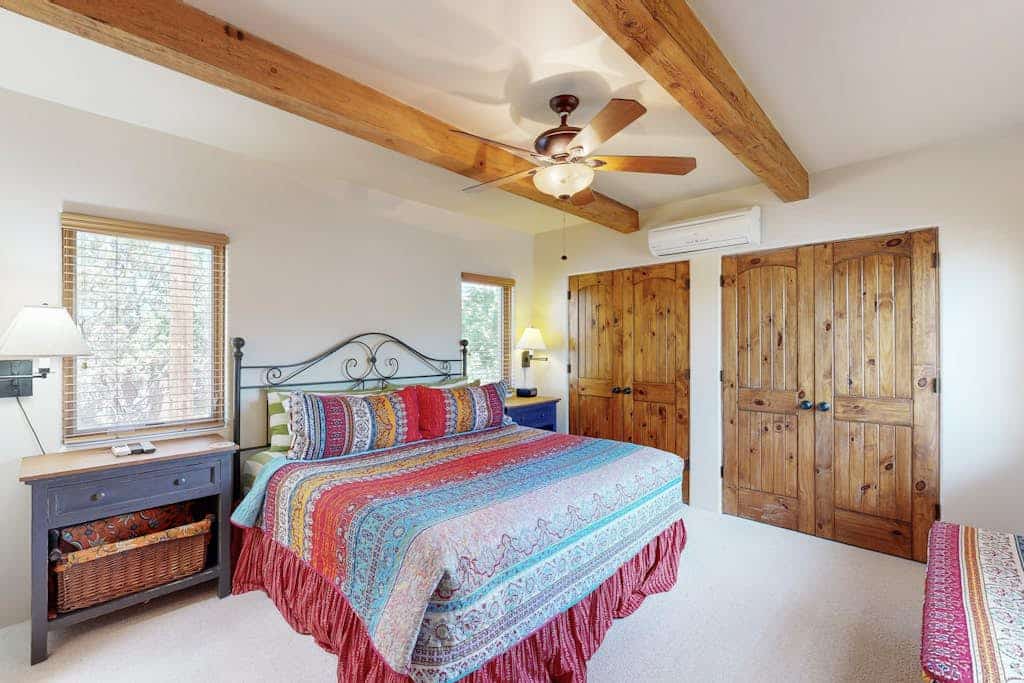 Experience the charm of historic Santa Fe from Susan's Hideaway, a beautifully appointed 2-bedroom, 3-bath adobe-inspired retreat just a short walk from the Plaza. Spend your days exploring world-class galleries, museums, restaurants, and markets, then return to cozy evenings by the traditional kiva fireplace or unwind in one of two private outdoor living spaces. With two spacious king suites, a full kitchen, and authentic Southwestern style throughout, this home is the perfect blend of comfort, culture, and convenience.