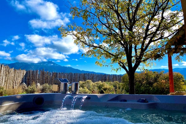 Step into a peaceful Taos retreat surrounded by sweeping mountain and valley views, where quiet mornings, glowing sunsets, and starlit evenings create the perfect backdrop for slowing down and settling in. Casa Nido blends warm Southwestern charm with thoughtfully designed indoor and outdoor spaces, offering a private escape just minutes from Taos Plaza. From relaxing in the hot tub beneath the stars to gathering around the chimenea after a day of exploring Northern New Mexico, this home feels both inspiring and deeply comfortable from the moment you arrive.
