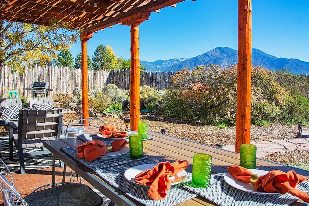 Step into a peaceful Taos retreat surrounded by sweeping mountain and valley views, where quiet mornings, glowing sunsets, and starlit evenings create the perfect backdrop for slowing down and settling in. Casa Nido blends warm Southwestern charm with thoughtfully designed indoor and outdoor spaces, offering a private escape just minutes from Taos Plaza. From relaxing in the hot tub beneath the stars to gathering around the chimenea after a day of exploring Northern New Mexico, this home feels both inspiring and deeply comfortable from the moment you arrive.  