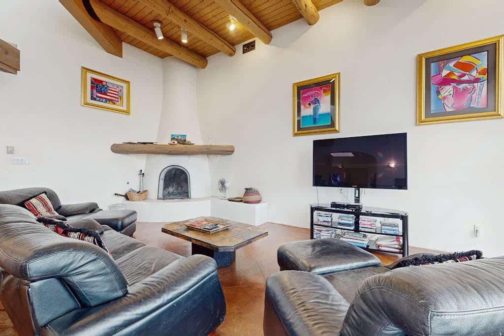 Wake up to sweeping desert views at this adobe-style retreat in Rancho de Taos, where privacy, space, and luxury come together inside the gated Taos Country Club community. Spend your days skiing Taos Ski Valley, golfing at sunrise, or exploring Santa Fe’s art and dining scene, then return home to unwind in the hot tub under star-filled skies. With a sauna, game room, firepit, and expansive indoor-outdoor living, this is a true Southwest escape designed for connection, comfort, and unforgettable stays.