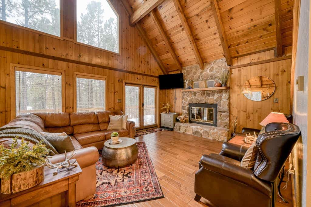 Escape to the mountains and settle into classic cabin charm with a modern twist. Coyote Cabin is built for groups and families looking to reconnect, offering 3 bedrooms, space for 8 guests, an expansive multi-level layout, and a converted garage game room that will keep the young at heart entertained for hours. Whether you are hitting the famous slopes, golfing, or relaxing on the massive deck, this is the ultimate Angel Fire home base where lasting memories are made.