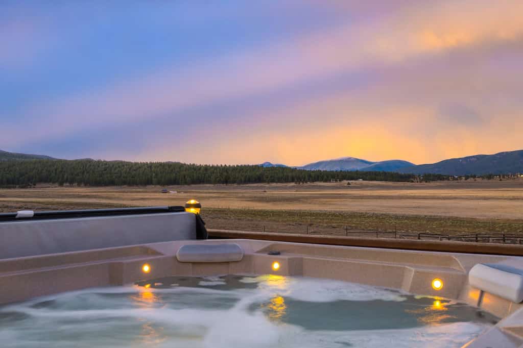 Wake up to mountain views and crisp Angel Fire air, then end the day in your private hot tub under a sky full of stars. Sunrise Vista Villa is made for gathering, with 4 bedrooms, room for 11, two cozy living spaces, and plenty of room to reconnect after skiing, biking, hiking, or exploring. This is the kind of mountain getaway that feels easy, memorable, and hard to leave.