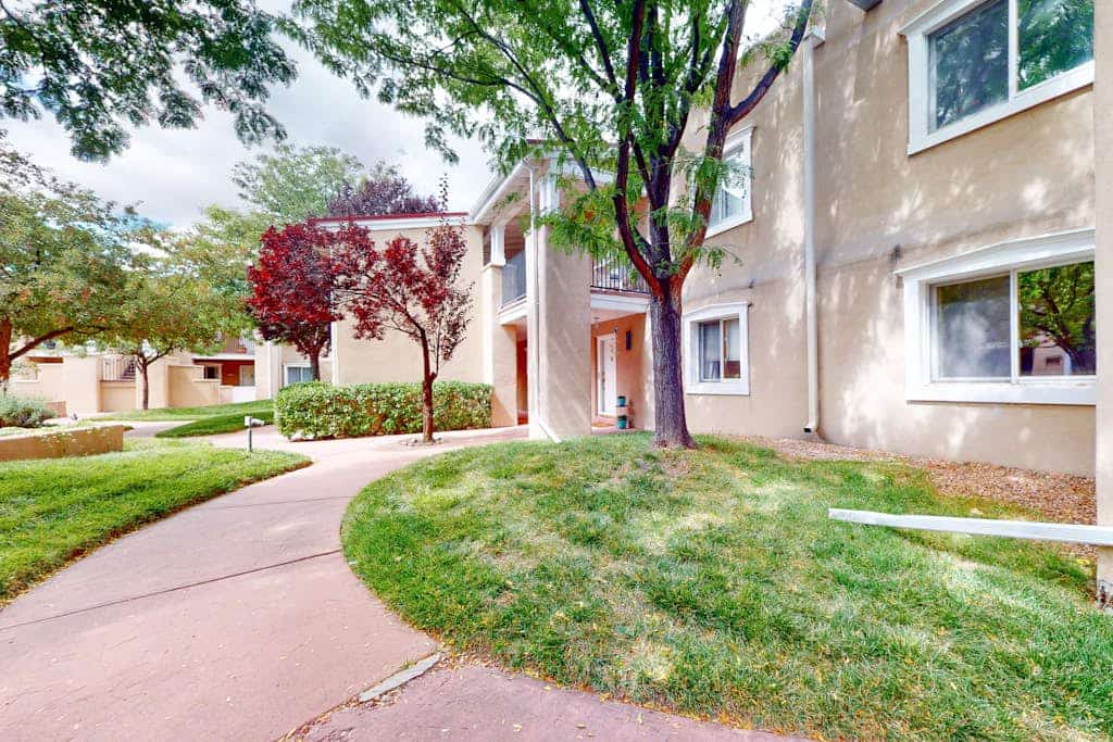 This charming, newly renovated and remodeled condo is located in El Matador, a quiet gated community adorned with mature trees. Filled with art and a cozy ambiance, the home features a beautiful library stocked with over 100 books covering the cuisine, art, and history of New Mexico. Enjoy the warm glow of the gas fireplace or step outside onto the second floor landing to sip your morning coffee. Located just blocks from Artist Road, you can walk to downtown shops or take a short drive straight up to Ski Santa Fe.