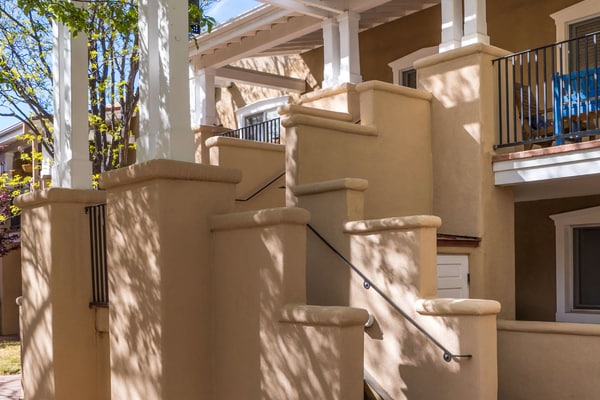 This charming, newly renovated and remodeled condo is located in El Matador, a quiet gated community adorned with mature trees. Filled with art and a cozy ambiance, the home features a beautiful library stocked with over 100 books covering the cuisine, art, and history of New Mexico. Enjoy the warm glow of the gas fireplace or step outside onto the second floor landing to sip your morning coffee. Located just blocks from Artist Road, you can walk to downtown shops or take a short drive straight up to Ski Santa Fe.
