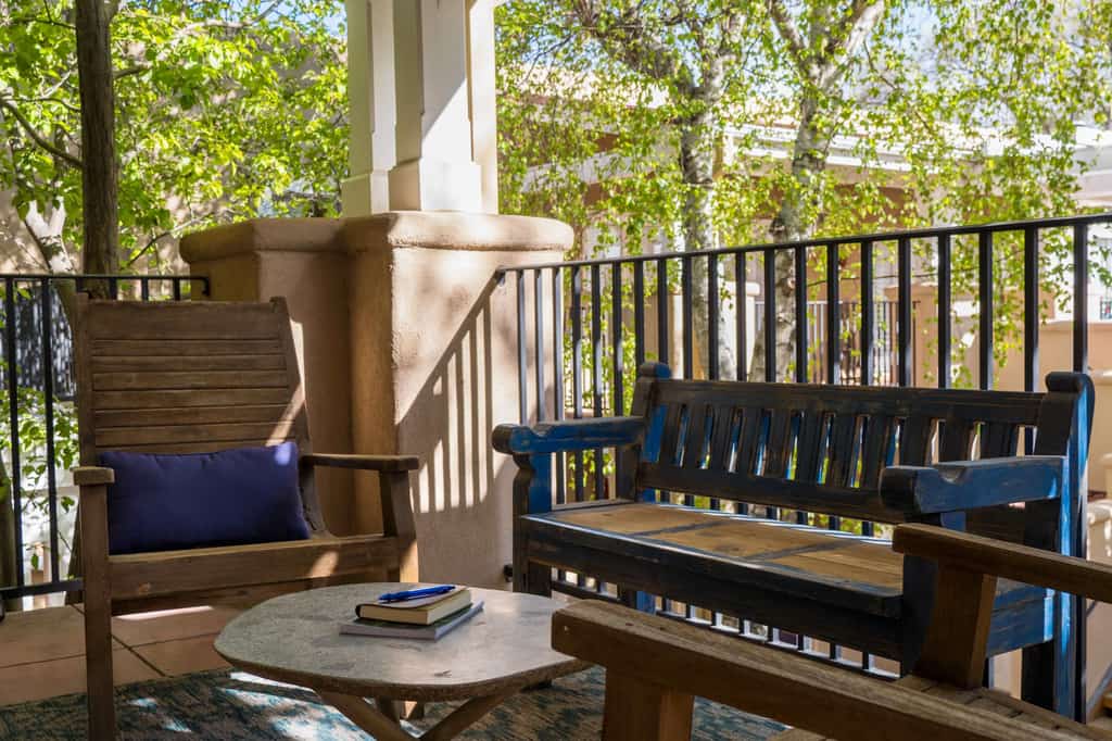 This charming, newly renovated and remodeled condo is located in El Matador, a quiet gated community adorned with mature trees. Filled with art and a cozy ambiance, the home features a beautiful library stocked with over 100 books covering the cuisine, art, and history of New Mexico. Enjoy the warm glow of the gas fireplace or step outside onto the second floor landing to sip your morning coffee. Located just blocks from Artist Road, you can walk to downtown shops or take a short drive straight up to Ski Santa Fe.
