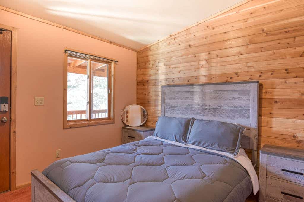 If you're planning the perfect family escape, look no further than this darling Angel Fire cabin featuring a private hot tub! Wait for it Getaway is made for gathering and making memories, offering 2 bedrooms plus a sunlit loft, a full-size pool table, and a wraparound deck for viewing local wildlife. It is the kind of mountain getaway that feels easy, memorable, and hard to leave.