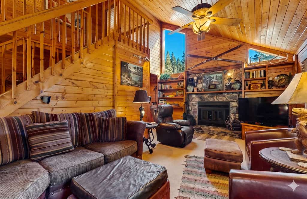 Reconnect at this rustic mountain retreat on a spacious corner lot surrounded by pines. Located less than a mile from Monte Verde Lake, this home is designed for large groups to recharge. After a day of golf or kayaking, relax on the heated front deck, enjoy the wet bar, or gather around the massive rock fireplace. With 5 bedrooms, 4 bathrooms, and a private swing set for kids, it’s the ultimate basecamp for year-round family adventures in Angel Fire.