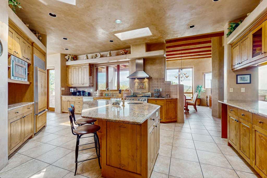 <b> Mountain-View Magic </b>

Perched at the foothills of the Sangre de Cristo Mountains, this elegant estate offers a front-row seat to Santa Fe’s famous painted skies. Sip your morning coffee in the secluded courtyard or host a sunset dinner on the wraparound patio with sweeping alpine vistas. With three private suites and a chef’s kitchen, this home is designed for those who want the peace of the mountains just 10 minutes from the heartbeat of the Plaza.
