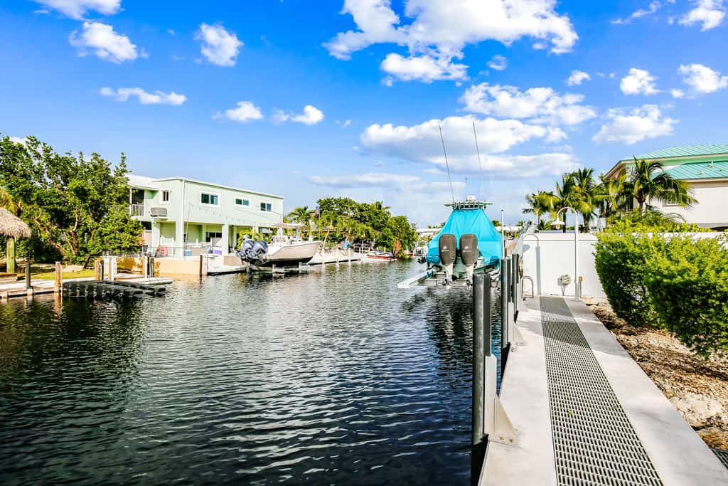 Waterfront home with amazing views, boat dock, screened porch & water sport gear