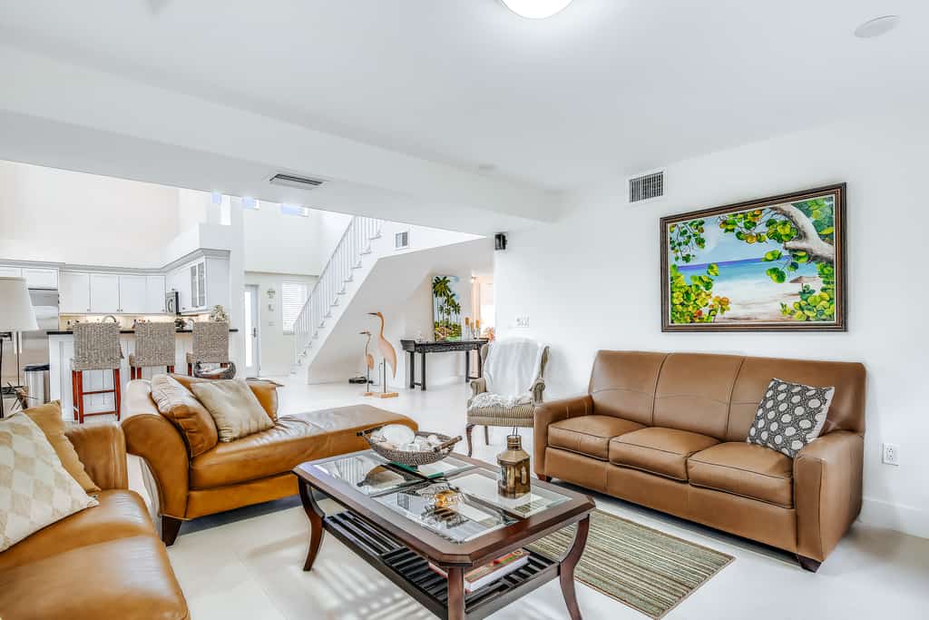 Waterfront home with amazing views, boat dock, screened porch & water sport gear