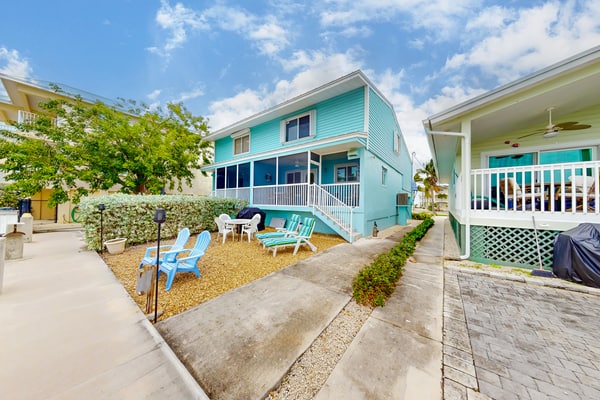 Canal-front home with Cabana Club access, water view, & private W/D