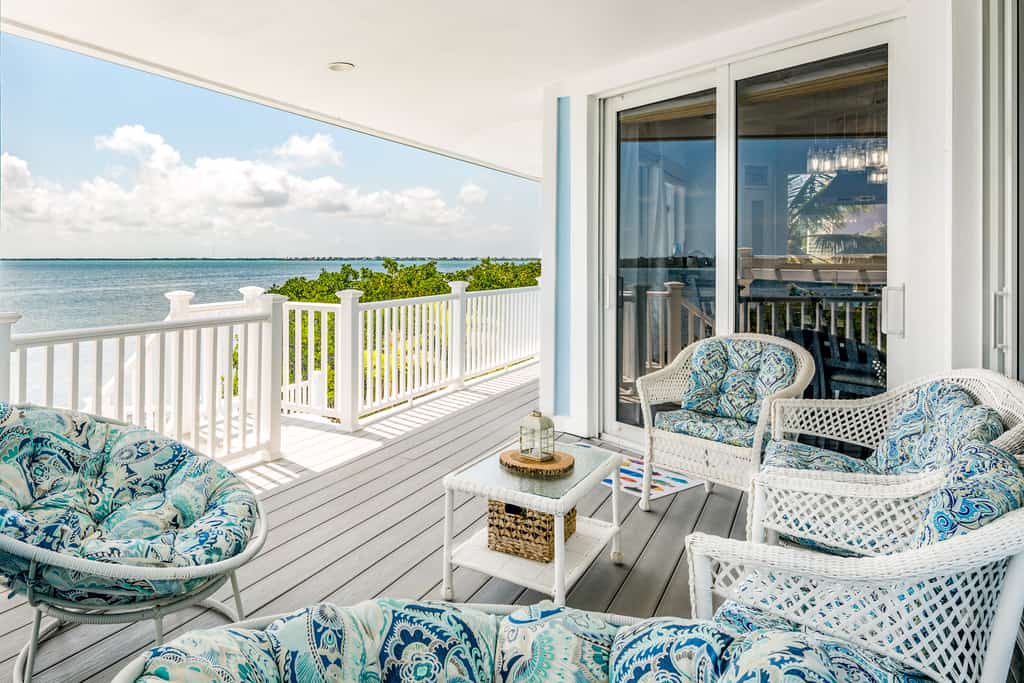 Amazing waterfront home with private beach, dock, pool, WiFi & outdoor kitchen